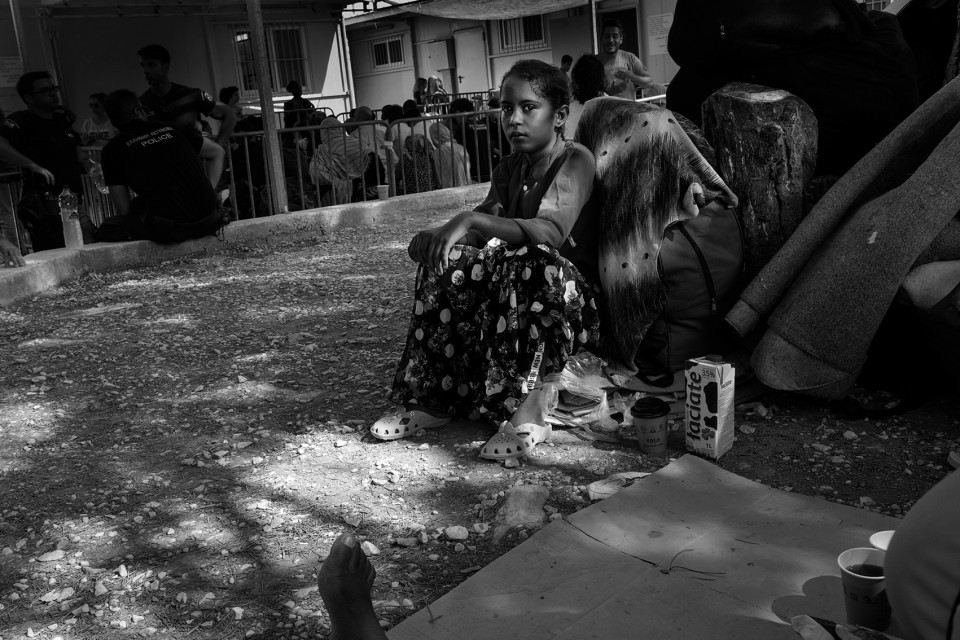 A newly arrived girl from Somalia inside the refugee camp Moria, Lesbos, Greece