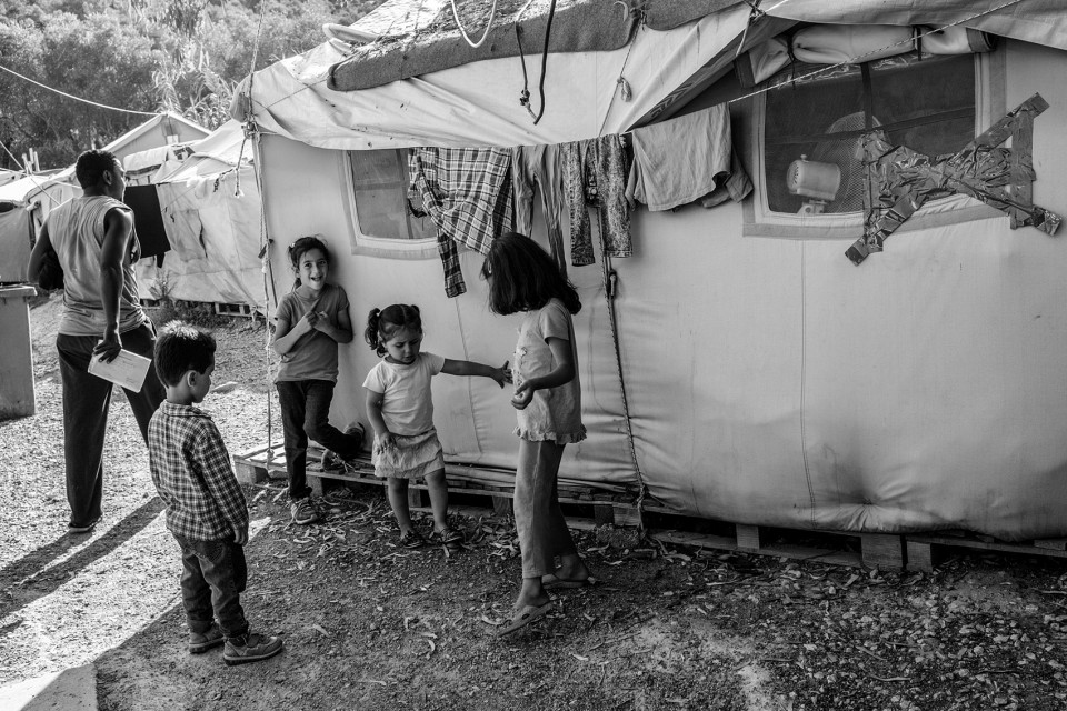 Children inside the refugee camp Moria, Lesbos, Greece